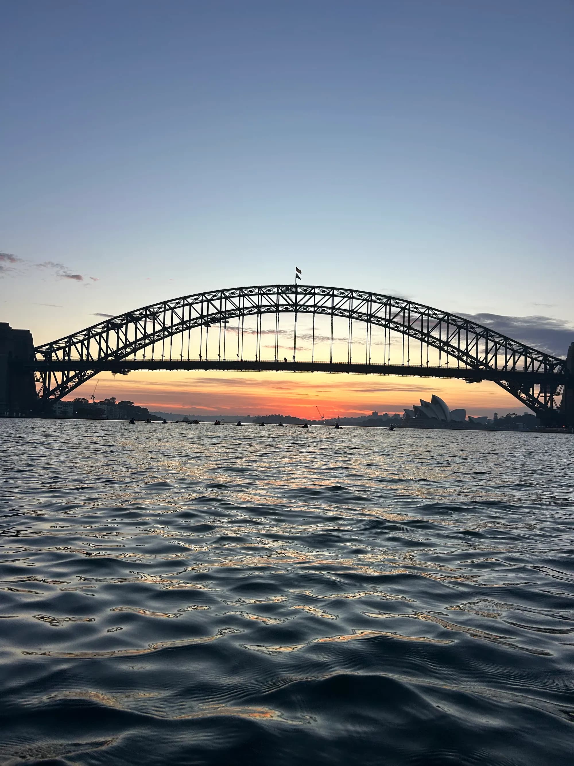 Sydney Harbour Bridge and Opera House at sunset